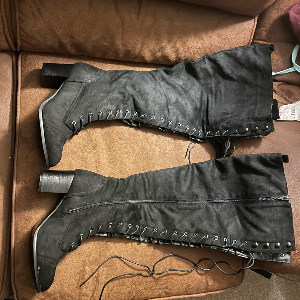 Wide thigh high heeled boots